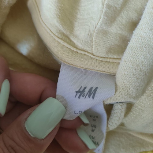 H&M sweatshirt used, yellow, size M with small stain