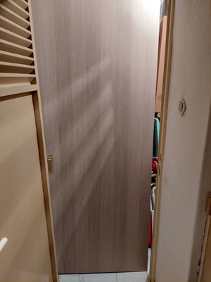 Wooden sliding interior door used, with minor dents, no mechanism