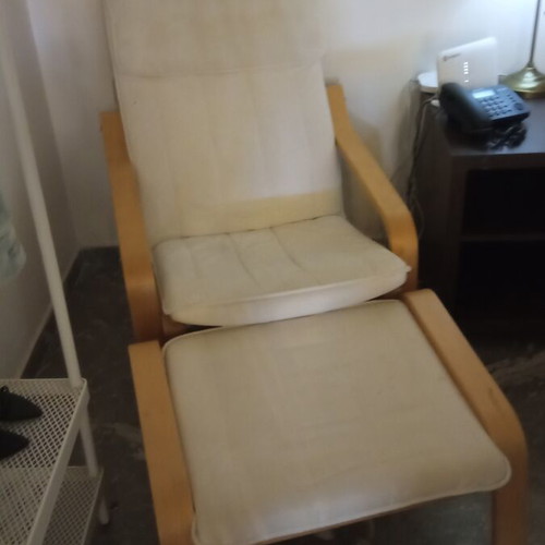 IKEA armchair with footstool used, wooden frame and removable cotton covers