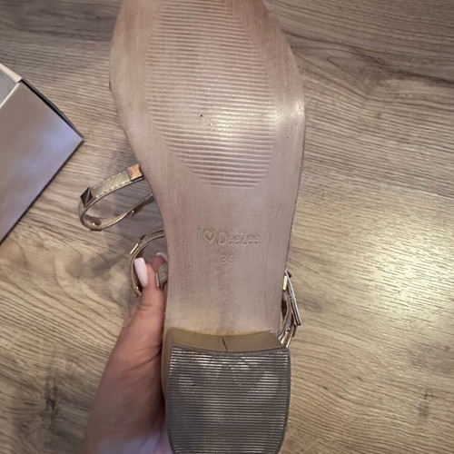 Gold sandals new with studs, size 39