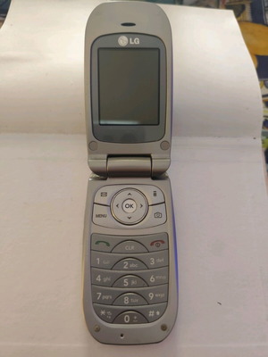 LG KP202 used, no charger, unknown functionality