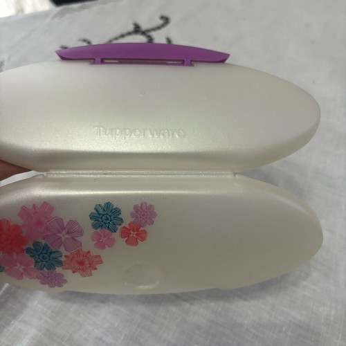 Tupperware glasses case used