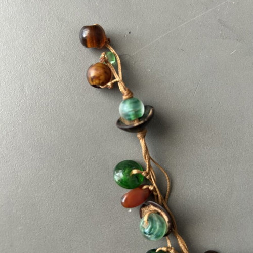 Handmade bracelet with colorful glass beads on cord like new