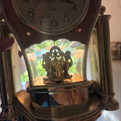 Quartz decorative table clock used with rotating Christmas scene