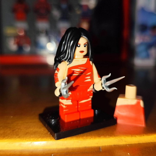 Elektra Red Battle Damaged Suit minifigure like new