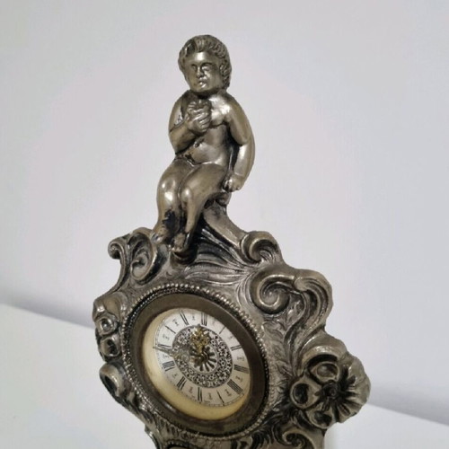 Antique clock used with German mechanism and porcelain decoration