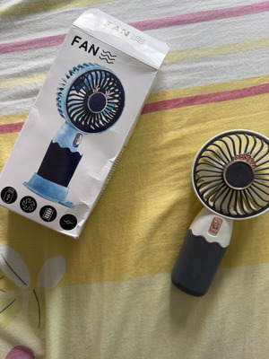 Portable fan with base and cable
