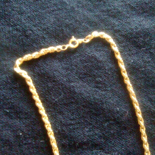 Necklace and earrings like new gold-colored