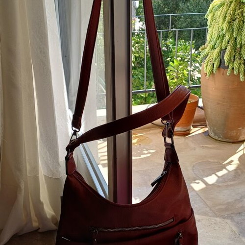 Handbag new, wine color with multiple external pockets