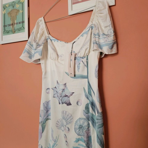 Nidodileda dress new, size M, white and turquoise