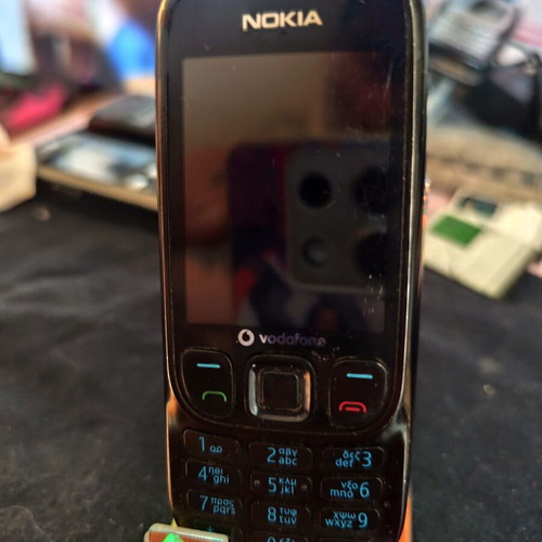 Nokia 6303 Classic phone used, black, with charger