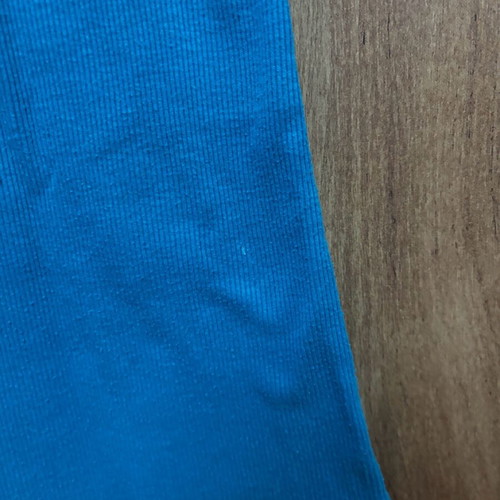 Blue sleeveless T-shirt used, size M/L with back design