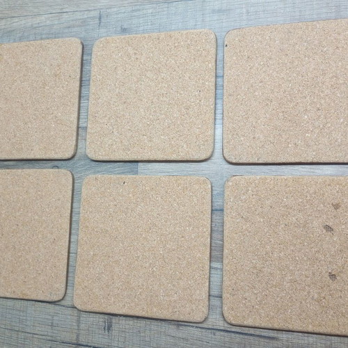 Coasters like new, set of 6 with cork base