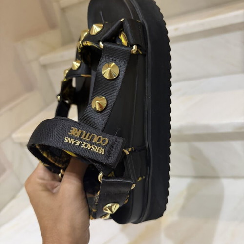 Versace sandals used, black and gold, size 40