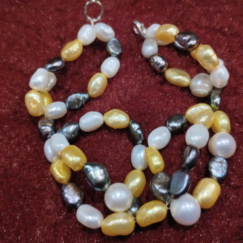 Natural pearl set like new with necklace, bracelet and earrings