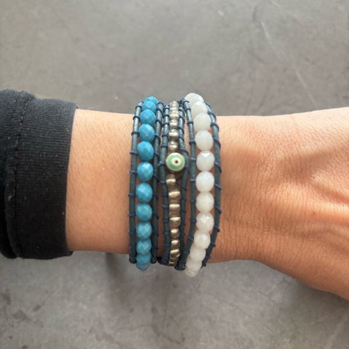 Leather bracelet like new with beads and blue evil eye detail