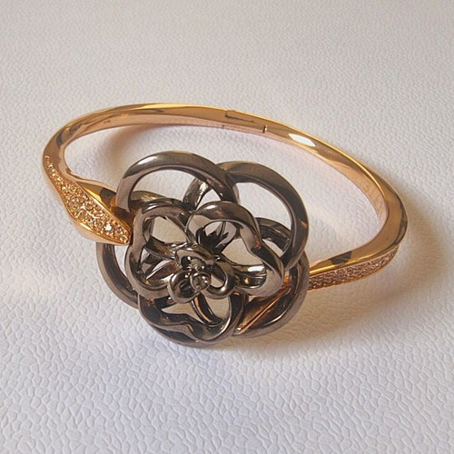 Flower-Snake bracelet by JETTE like new with intricate snake design