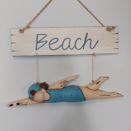 Wooden wall decoration swimmer like new