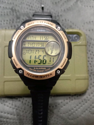 Casio AE3000W gold digital watch used with triple time display