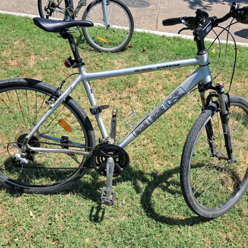 ZZK and GT Timberline Ltd trekking bicycles, silver, with gears
