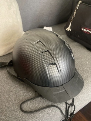 Equestrian helmet like new for ages 13-14