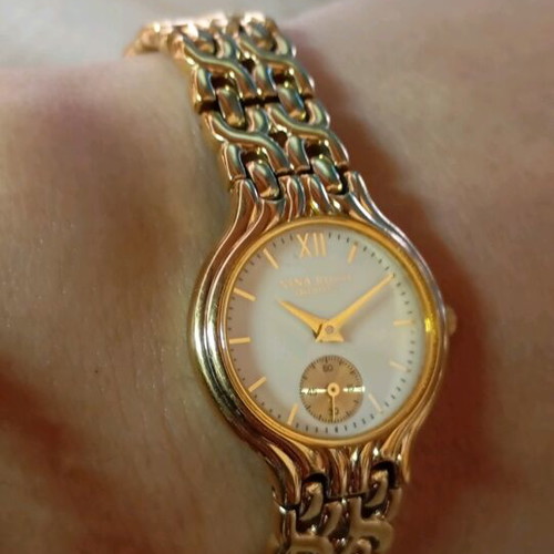 Nina Rossi wristwatch gold like new, women's