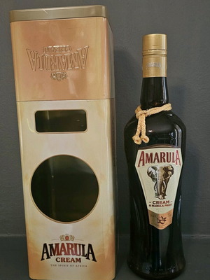 Amarula liqueur bottle empty with collectible metal box like new
