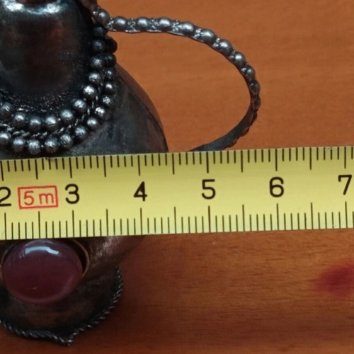 Perfume bottle antique like new, can be chained to necklace
