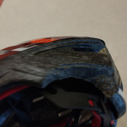 Bicycle helmet used, teen size 54-58 cm with left side wear