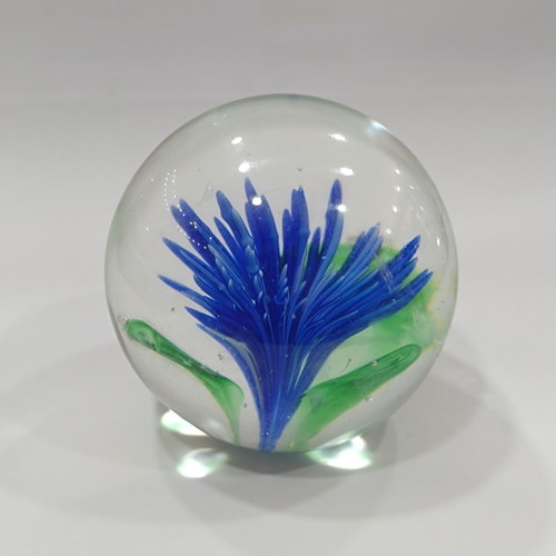 Vintage handmade art glass paperweight with blue flower
