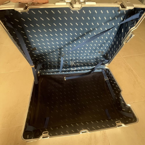 Rimowa travel bag used, silver color, slight defect