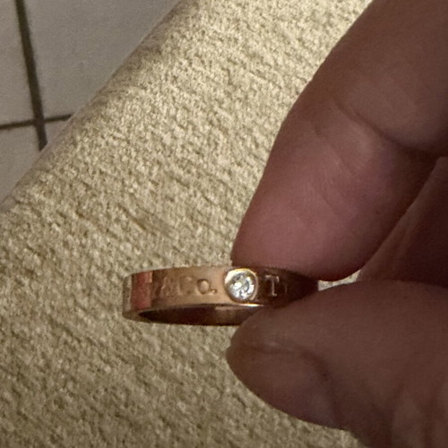 Ring in rose gold color with 3 zirconia, like new