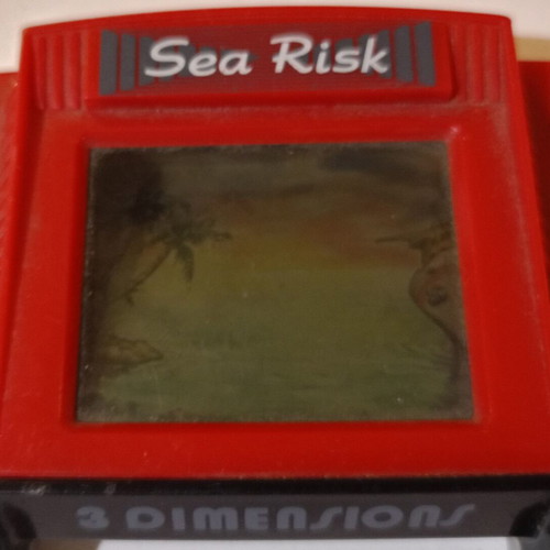 Vintage handheld game Sea Risk 3 dimensions model 727 used