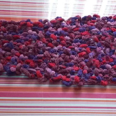 Handmade knitted scarf new with tassels in red and purple tones