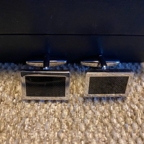 Tie rack cufflinks used, black