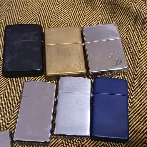 Zippo lighters used, pack of 12, two without inserts