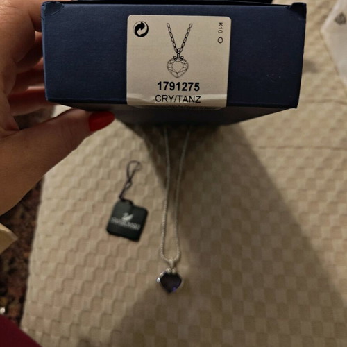 Swarovski pendant with purple heart like new