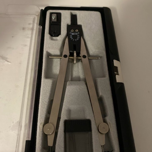 Compass used with box, sharpener, and replacement tips
