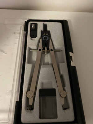 Compass used with box, sharpener, and replacement tips