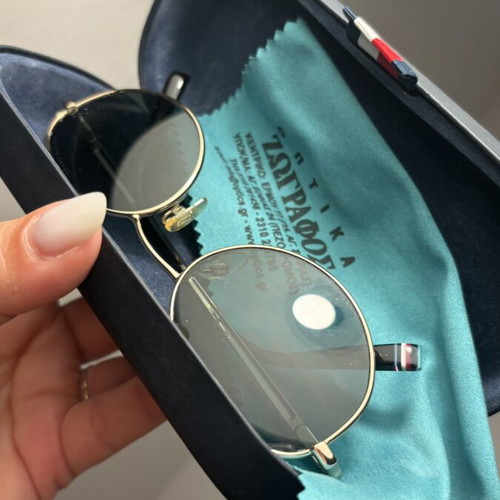 Tommy Hilfiger sunglasses with gold frame and dark lenses