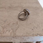 Faux ring with purple stone used, adjustable size