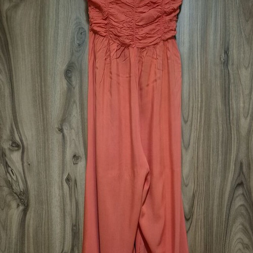 Coral one-piece jumpsuit with wide legs
