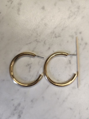 Gold hoop earrings medium size used