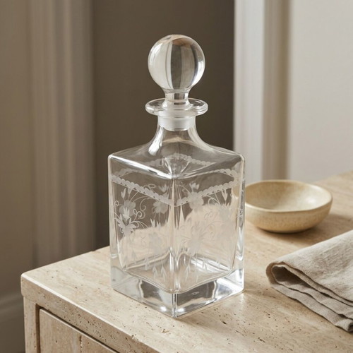 Vintage carafe with engraved floral designs and glass stopper like new