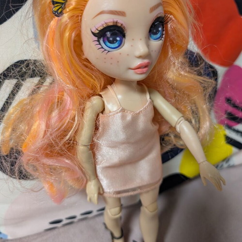 Rainbow High Poppy Rowan Fashion Doll with 2 Mix & Match Outfits, like new