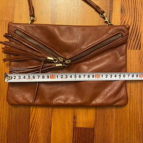Leather crossbody bag camel brown used with envelope style