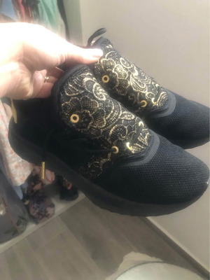 Puma Ignite Tsugi Shinseh black and gold athletic shoes used, size 40.5