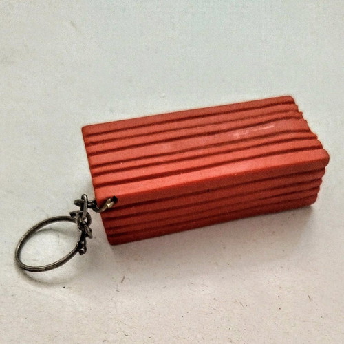 Happy Brick keychain like new, soft and lightweight