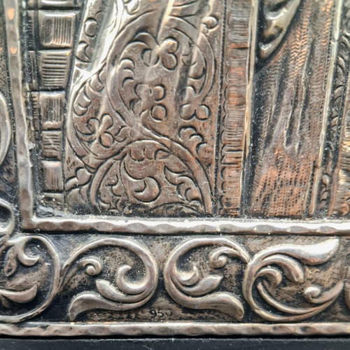 Silver embossed icon of Saint Nicholas used, with wooden base