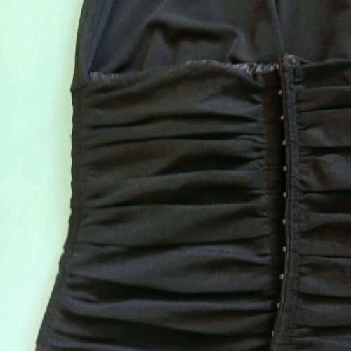 Unique halterneck corset size M/L like new, black